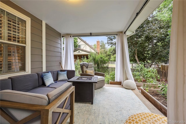 view of patio featuring an outdoor fire pit