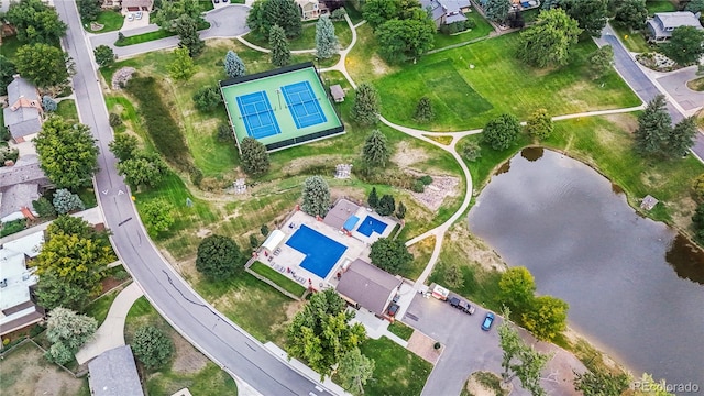 drone / aerial view with a water view