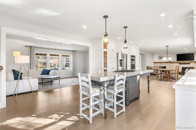 dining room with light hardwood / wood-style flooring