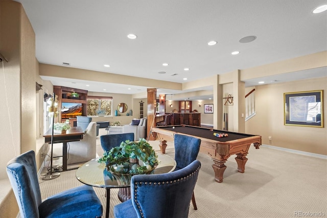 game room featuring light colored carpet, bar area, pool table, and ornate columns