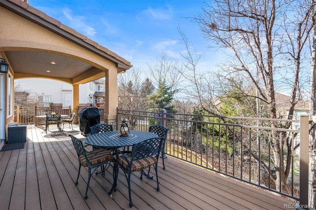 wooden deck with area for grilling