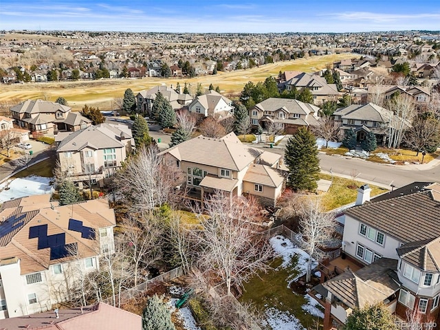 birds eye view of property with a residential view