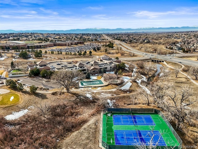 birds eye view of property featuring a mountain view