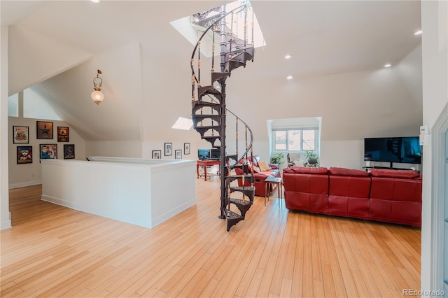 1165 N Pennsylvania St Unit 3B, Denver, CO 80203 - living room with stairway, wood finished floors, recessed lighting, and high vaulted ceiling