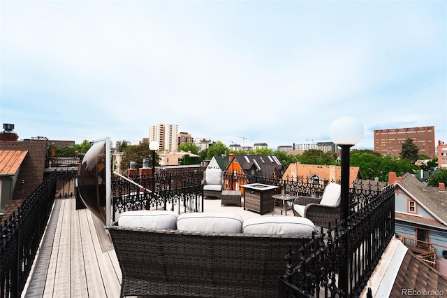 1165 N Pennsylvania St Unit 3B, Denver, CO 80203 - wooden terrace featuring an outdoor hangout area