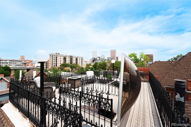 1165 N Pennsylvania St Unit 3B, Denver, CO 80203 - wooden terrace with a view of city