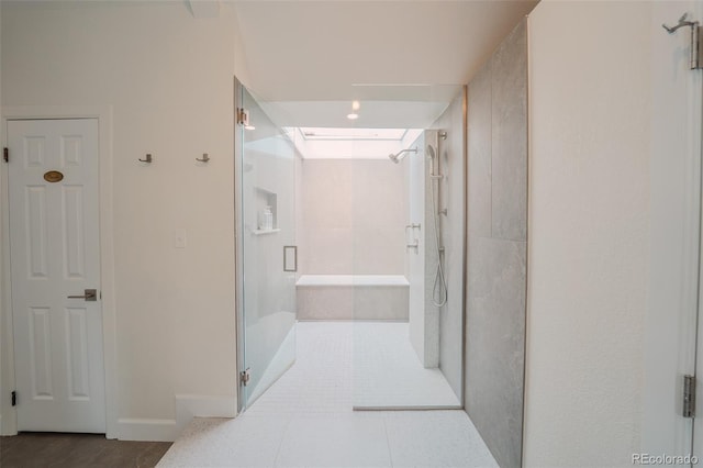 1165 N Pennsylvania St Unit 3B, Denver, CO 80203 - corridor with baseboards and tile patterned floors