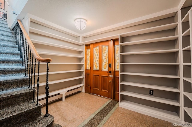 1165 N Pennsylvania St Unit 3B, Denver, CO 80203 - entrance foyer featuring stairs and a baseboard heating unit