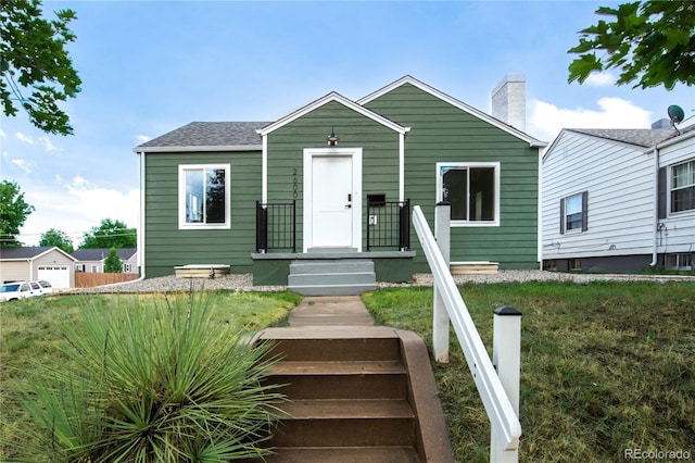 2600 S Downing St, Denver, CO 80210 - bungalow-style house with a chimney