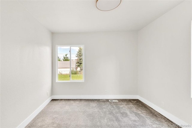 2600 S Downing St, Denver, CO 80210 - unfurnished room featuring carpet floors and baseboards
