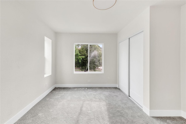 2600 S Downing St, Denver, CO 80210 - unfurnished bedroom featuring carpet floors and a closet