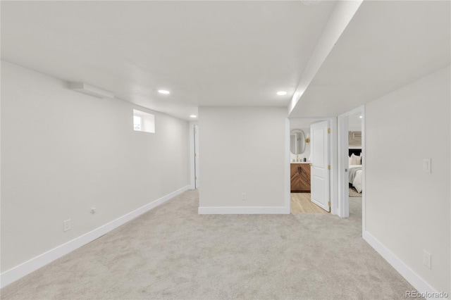 2600 S Downing St, Denver, CO 80210 - basement featuring light carpet and recessed lighting