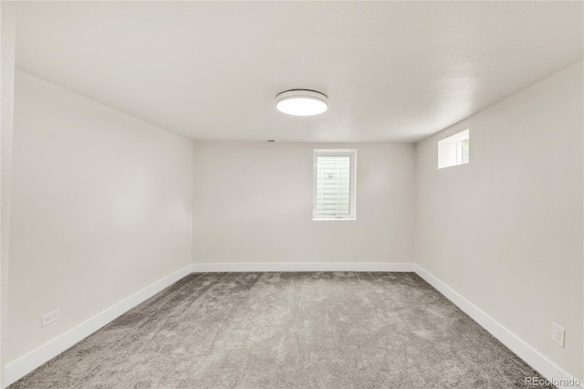 2600 S Downing St, Denver, CO 80210 - empty room featuring baseboards and carpet