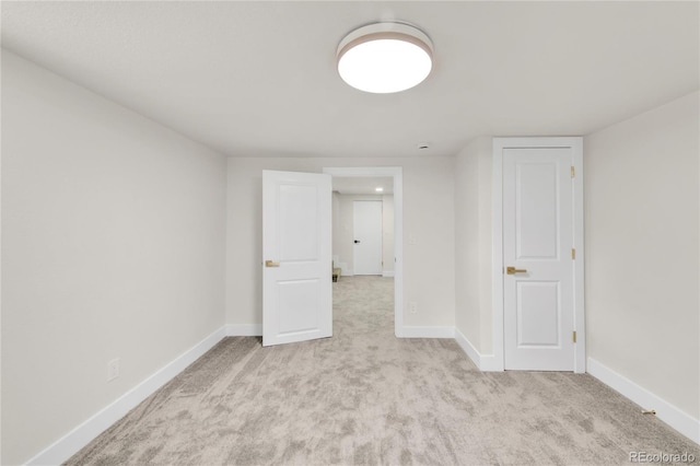2600 S Downing St, Denver, CO 80210 - carpeted empty room featuring baseboards