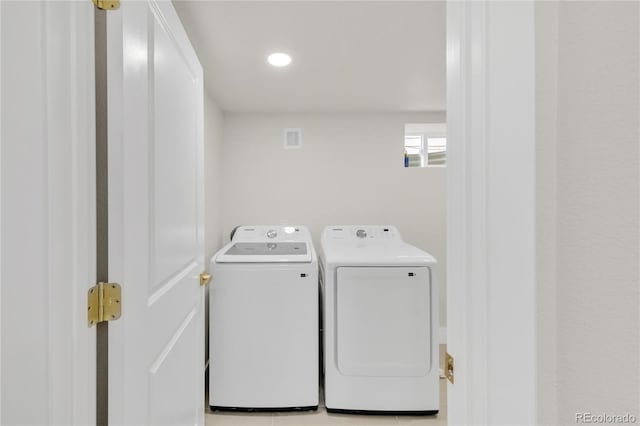 2600 S Downing St, Denver, CO 80210 - laundry area with washing machine and dryer and recessed lighting