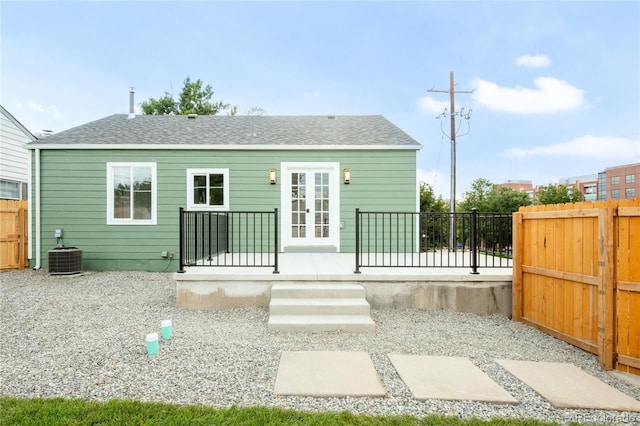 2600 S Downing St, Denver, CO 80210 - rear view of property with roof with shingles
