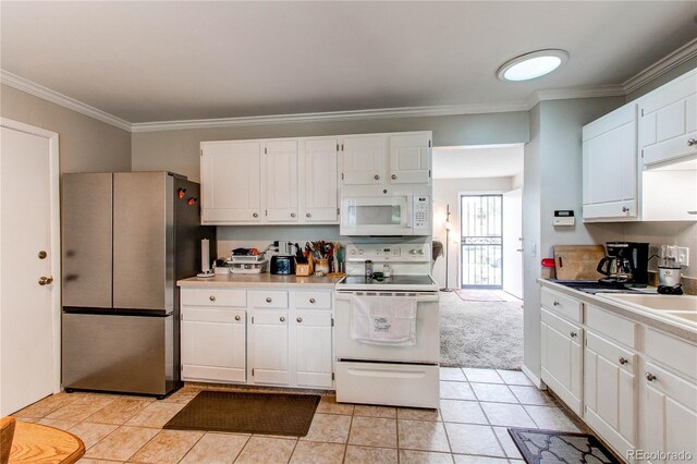 6120 W 111th Ave, Westminster, CO 80020 - kitchen featuring white appliances, ornamental molding, white cabinets, light countertops, and light tile patterned floors