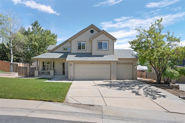 view of front property with a garage and a front yard