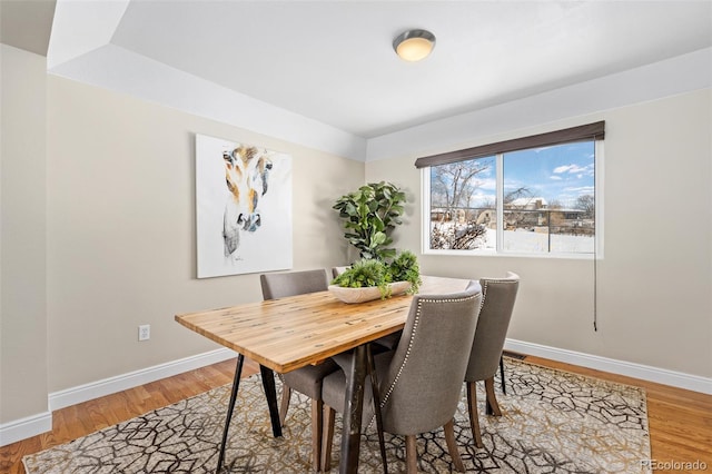 dining room featuring hardwood / wood-style flooring