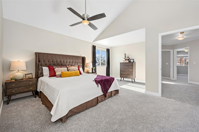 carpeted bedroom featuring ceiling fan and high vaulted ceiling