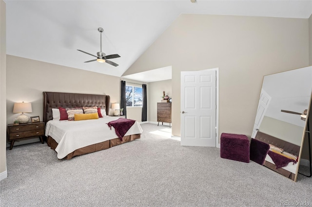 bedroom featuring ceiling fan, carpet floors, and high vaulted ceiling