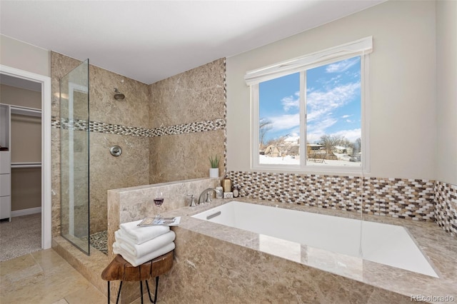 bathroom with plus walk in shower and tile patterned floors