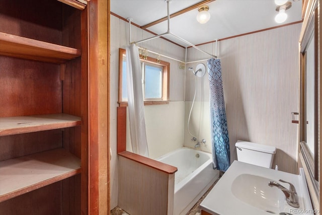 full bathroom featuring shower / bath combo, toilet, and sink