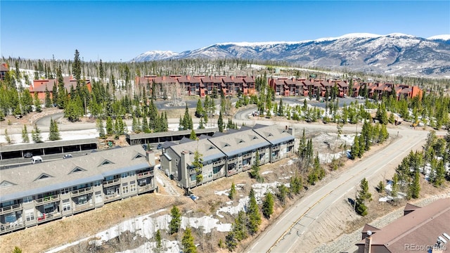 drone / aerial view featuring a mountain view