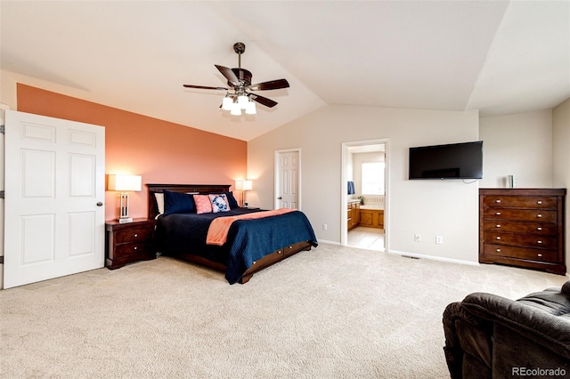 22962 Briar Leaf Ave, Parker, CO 80138 - bedroom with lofted ceiling, light colored carpet, baseboards, connected bathroom, and ceiling fan