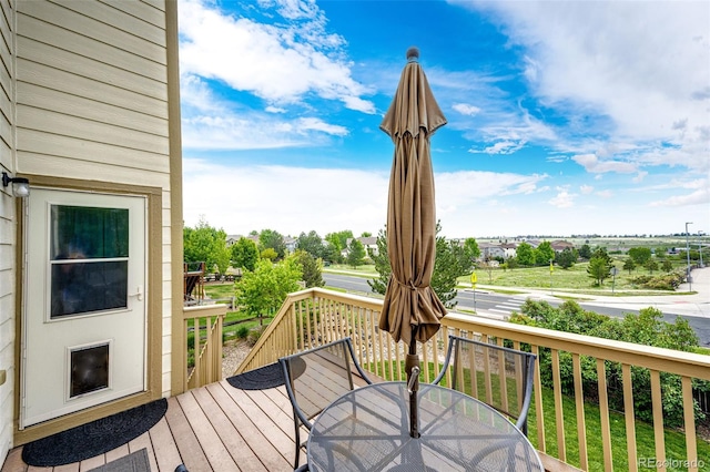 22962 Briar Leaf Ave, Parker, CO 80138 - wooden deck featuring outdoor dining area