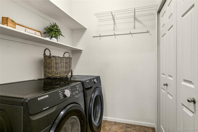 laundry room featuring separate washer and dryer