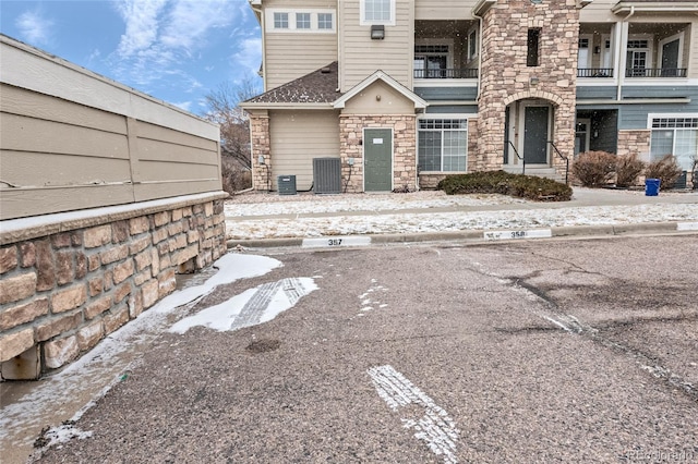 view of front of property featuring central AC unit