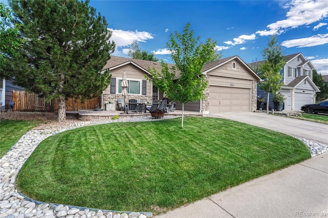 5402 S Queen Way, Littleton, CO 80127 - view of property hidden behind natural elements with concrete driveway, a garage, and an outdoor fire pit