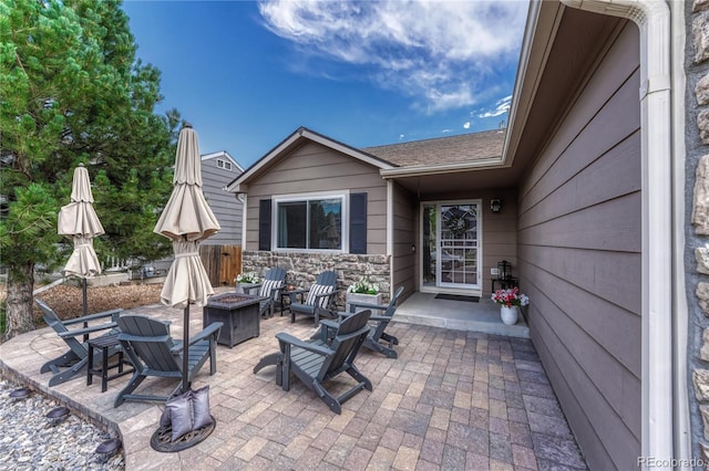 5402 S Queen Way, Littleton, CO 80127 - view of patio / terrace featuring a fire pit