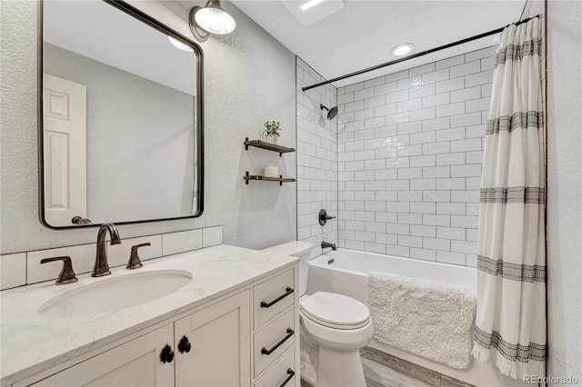 5402 S Queen Way, Littleton, CO 80127 - bathroom with vanity, shower / bath combo, wood finished floors, and a textured wall