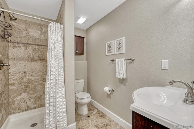 5402 S Queen Way, Littleton, CO 80127 - full bathroom with vanity, a shower stall, and tile patterned flooring