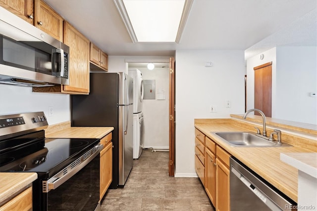 kitchen featuring stainless steel appliances and sink