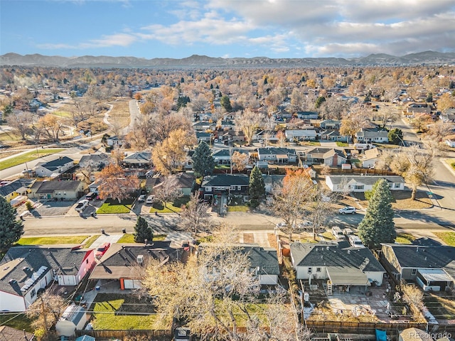 birds eye view of property featuring a mountain view