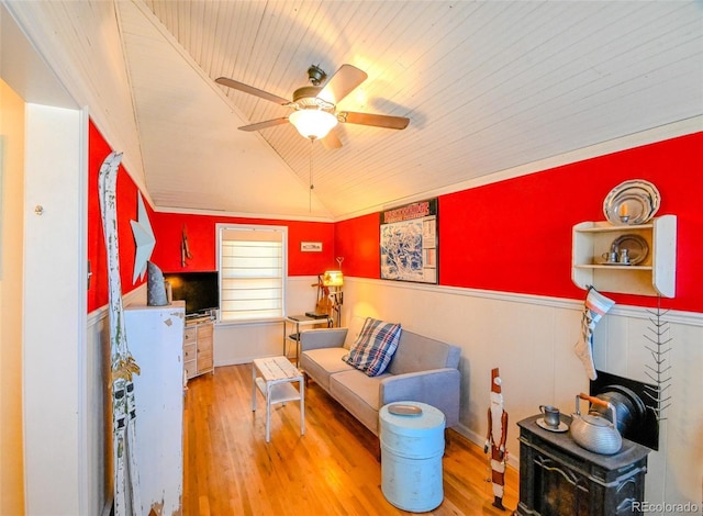 living area with light wood-type flooring, wooden ceiling, ceiling fan, and lofted ceiling