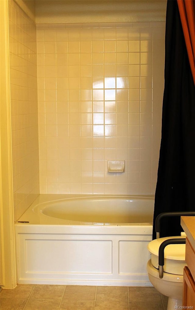 bathroom with tile patterned floors, toilet, and vanity