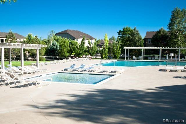 3220 Boulder Cir Unit 103, Broomfield, CO 80023 - community pool with a pergola and a patio