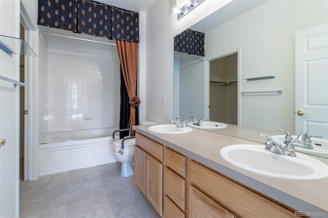 3220 Boulder Cir Unit 103, Broomfield, CO 80023 - bathroom with double vanity, tile patterned floors, and shower / tub combination