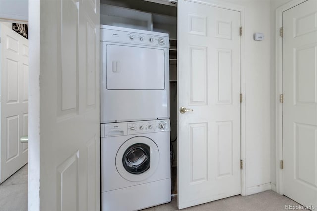 3220 Boulder Cir Unit 103, Broomfield, CO 80023 - laundry area with stacked washer / dryer