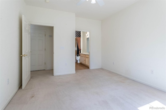 3220 Boulder Cir Unit 103, Broomfield, CO 80023 - unfurnished bedroom with light colored carpet, ensuite bath, and ceiling fan