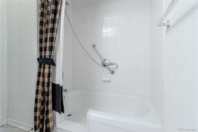3220 Boulder Cir Unit 103, Broomfield, CO 80023 - bathroom with shower / bathtub combination with curtain