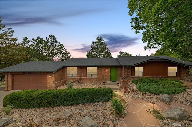 19 Rock Ln, Castle Rock, CO 80104 - ranch-style home featuring an attached garage and brick siding