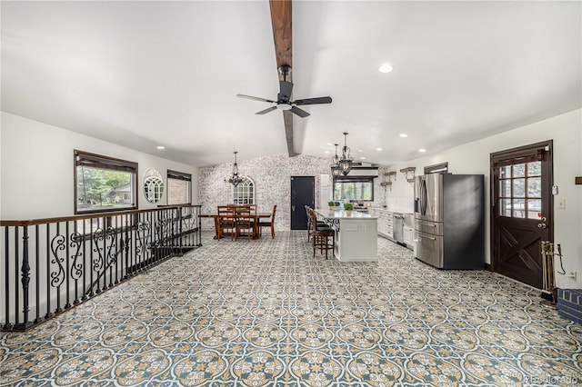 19 Rock Ln, Castle Rock, CO 80104 - kitchen with stainless steel appliances, a chandelier, a ceiling fan, healthy amount of natural light, and recessed lighting
