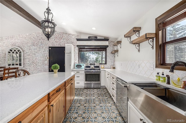 19 Rock Ln, Castle Rock, CO 80104 - kitchen with stainless steel appliances, lofted ceiling, open shelves, light countertops, and tasteful backsplash