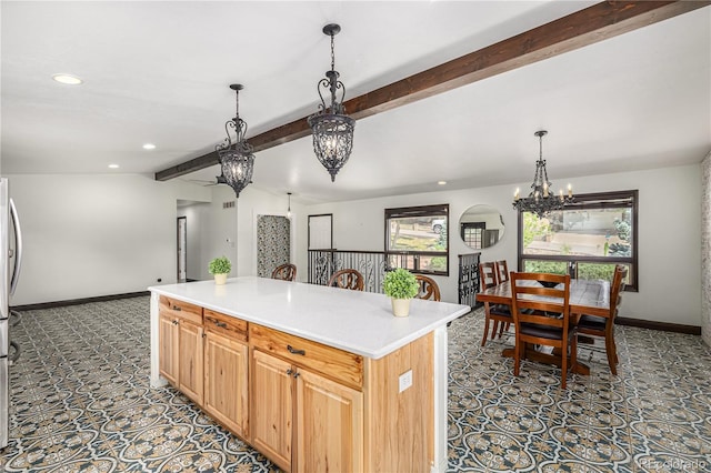 19 Rock Ln, Castle Rock, CO 80104 - kitchen with a chandelier, recessed lighting, light countertops, pendant lighting, and a kitchen island