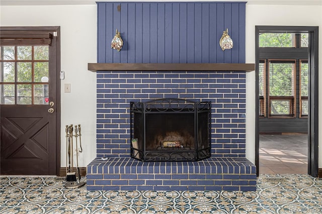 19 Rock Ln, Castle Rock, CO 80104 - detailed view of a brick fireplace and baseboards